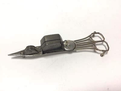 Lot 113 - A pair of George III silver scissor snuffers, by Abstainando King, London 1796, Patent stamp to one side, on three bun feet
