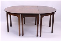 Lot 1323 - George III mahogany dining table with central...