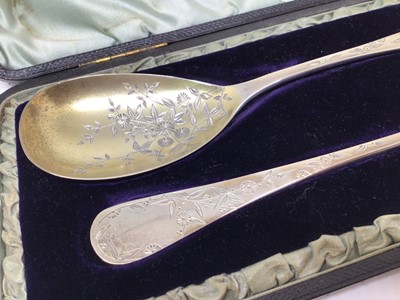 Lot 121 - Cased pair of Victorian silver spoons with fine engraved floral decoration and gilt bowls, 21cm long, Sheffield 1882 (Atkin Brothers), 4.6oz