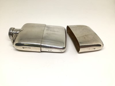 Lot 123 - Silver hip flask with bayonet cap and pull-off cup, 10cm x 7cm, Birmingham 1917