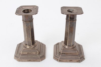 Lot 462 - Pair of George V silver candlesticks by James Dixon & Sons