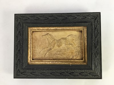 Lot 1239 - Relief panel, possibly plaster, depicting a galloping horse in the countryside, 12cm x 7cm, mounted in a gilt and carved ebony frame