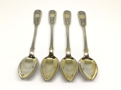 Lot 126 - Set of four silver and silver gilt Imperial Russian teaspoons with engraved decoration, hallmarked Moscow 1877-1917, 2.4oz