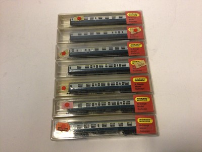 Lot 153 - Hornby Minitrix BR green Diesel D5379 (wrong box) plus five MK1 blue/grey Corridor Composite carriages N303 and two composite brake end carriages N306 (8)