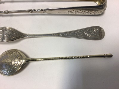 Lot 101 - Three pieces of Imperial Russian silver, including a pair of silver gilt tongs, 15cm long, Moscow c.1908 (Gerusim Mitrofanov), a serving fork, Moscow 1888 (Antip Kuzmichov) and a silver gilt spoon,...