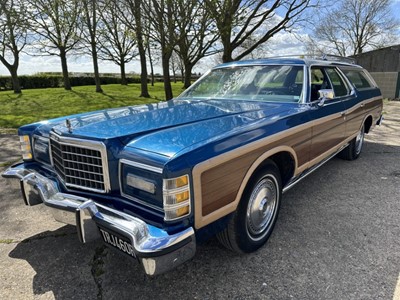 Lot 3 - 1977 Ford Country Squire Station Wagon, Registration TRJ460R. This splendid classic American estate car has blue coachwork with faux wood effect side panels.