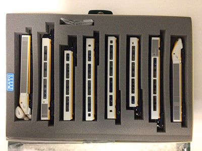 Lot 155 - Kato N gauge Eurostar 8 Car Set (front cone lose on one motor unit) and one other ( Motor units only-No carriages) 10-327 and two 4 Car Sets (Carriages only) 10-328, boxed (4)