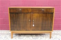 Lot 1333 - 1970s Gordon Russell teak and walnut sideboard...