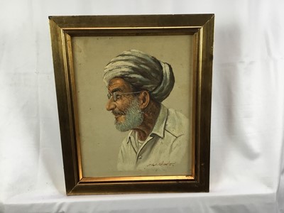 Lot 161 - Michael C. Hunt, an early 20th century, oil on canvas, of a bearded gentleman wearing a turban and glasses, signed, in gilt frame. 
25 x 20cm.