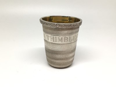 Lot 141 - Elizabeth II silver spirit cup in the form of a thimble, gilt interior, engraved 'Just a Thimbleful' (has been engraved over previously worn inscription), Birmingham 1996, 1.6oz