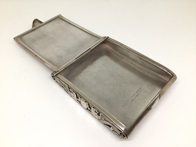 Lot 144 - Unusual German 900 silver cigarette case, the front and back engraved, the ends with winged lions in relief, 9.5cm x 8cm, 5.2oz