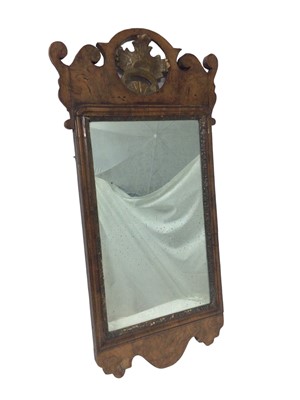 Lot 1521 - George II style walnut fretwork wall mirror