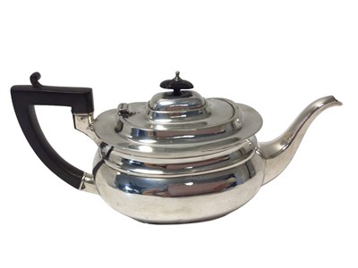 Lot 96 - Silver teapot with ebonised handle and knop