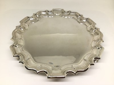 Lot 168 - Edwardian silver card tray, piecrust rim, scroll feet, Chester 1905 (William Aitken), 18.5cm diameter, 7.3oz