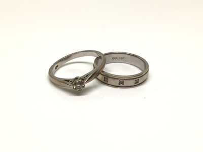 Lot 193 - 18ct white gold diamond single stone ring and an 18ct white gold wedding ring set with three diamonds (2)