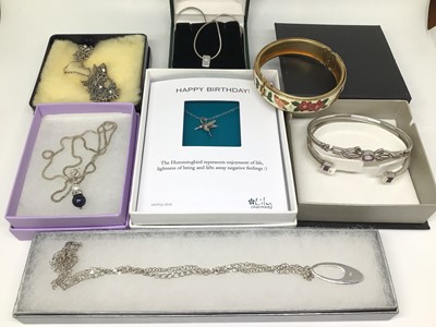 Lot 1024 - Two silver and amethyst bangles, enamelled bangle, four silver necklaces and one other