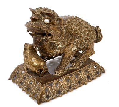 Lot 954 - Chinese  bronze of a Dog of Foo, pearl eyes, 19th century or earlier