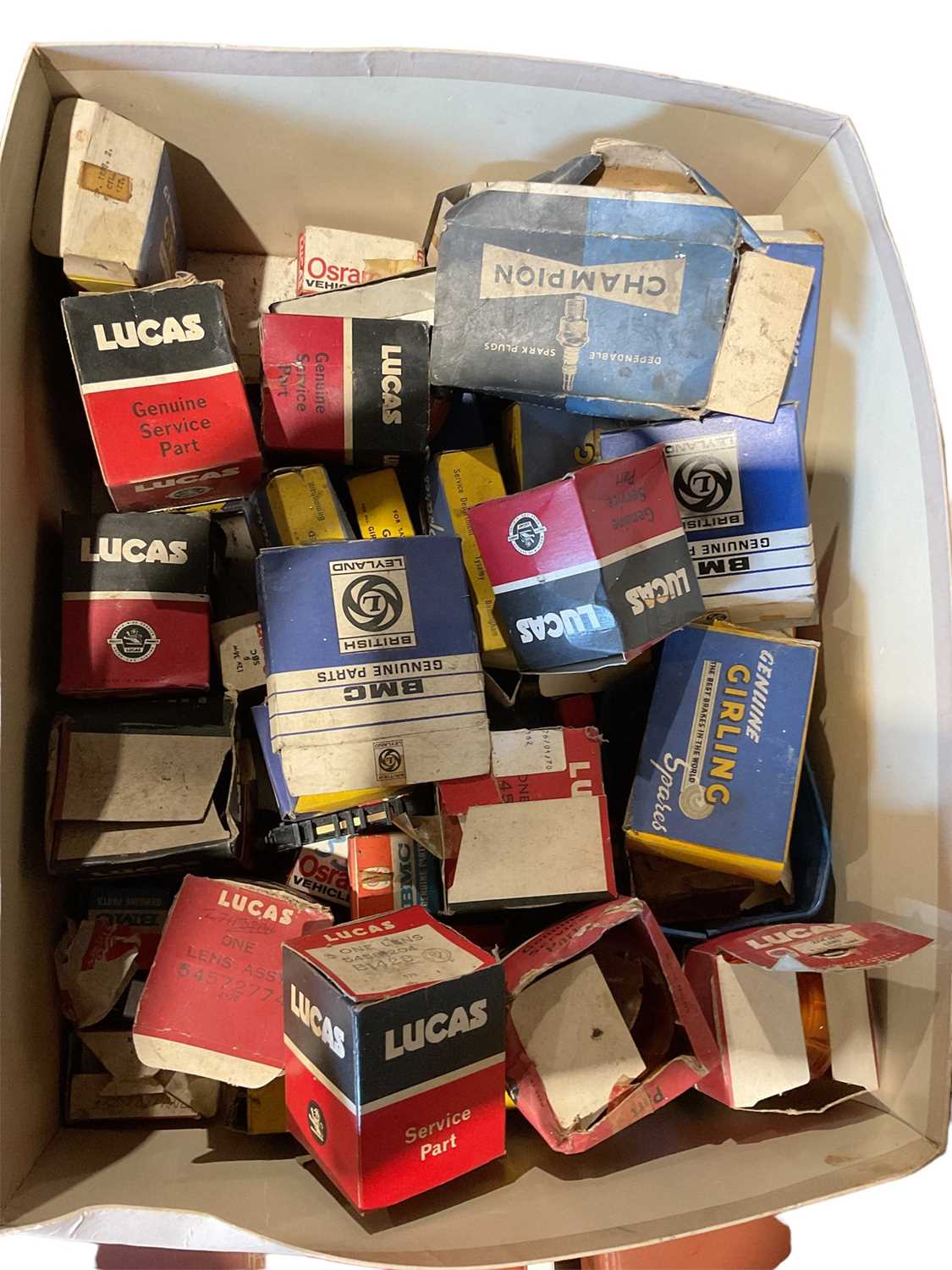 Lot 113 - Collection of various new old stock car fittings, mainly light lenses and units, in Lucas, Girling and BL / BMC branded boxes (1 box).