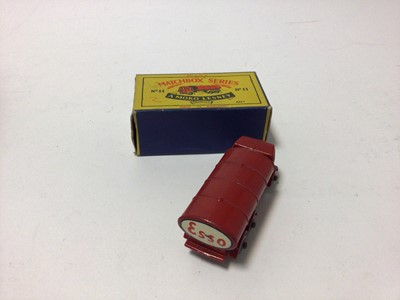 Lot 211 - Matchbox Moko Lesney No.29 Milk Van, No.7 Milk Float, No.11 Petrol Tanker, No.17 Metropolitan Taxi, all boxed (4)