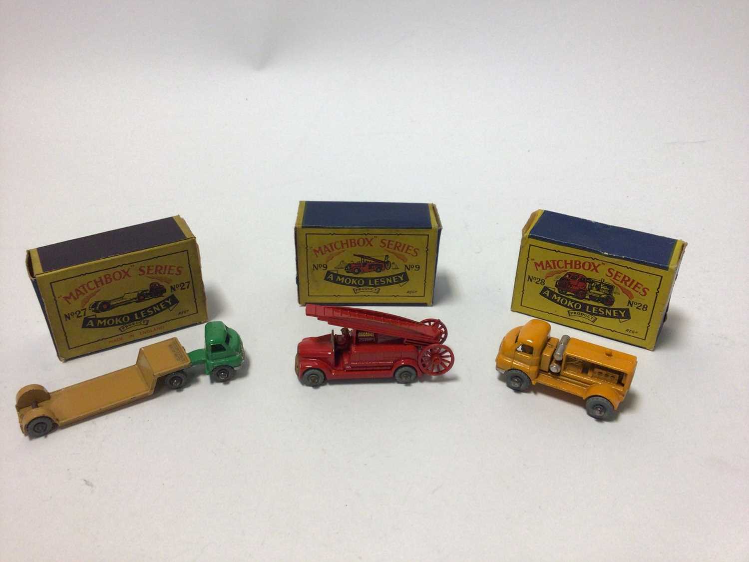 Lot 214 - Matchbox 1-75 Series Moko Lesney No.3 Cement Mixer, No.28 Compressor lorry, No.8 Caterpillar Tractor, No.27 Bedford Low Loader, No.9 Fire Escape (Dennis), all boxed (5)