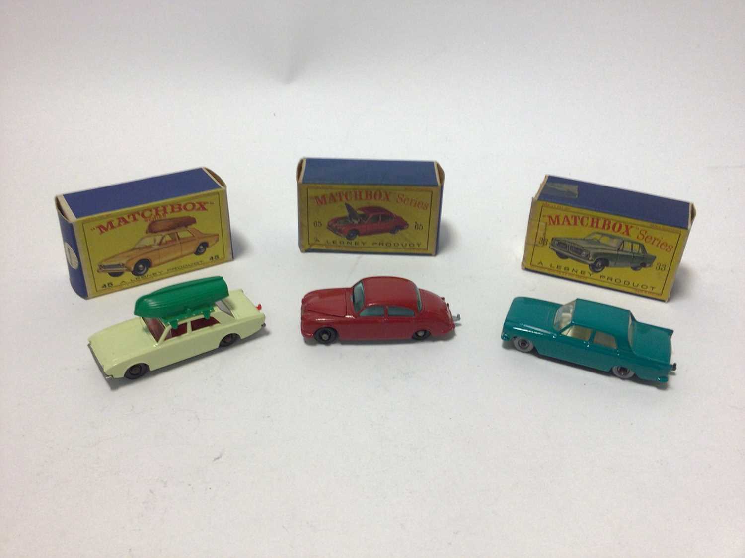 Lot 218 - Matchbox 1-75 Series no.45 Ford Corsair with Boat, No.32 E Type Jaguar, No.7 Ford Anglia, No.65 Jaguar 3.8 Sedan, No.55 Police Patrol Car, no.33 Ford Zephyr III, all boxed (6)