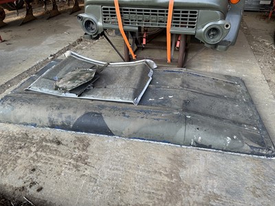 Lot 30 - Group of assorted Land Rover spares to include a roof, buck and front wing, believed to be from an ex. British Army 110, sold without reserve (Subject to 12% buyers premium inclusive of VAT).