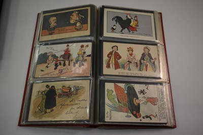 Lot 1414 - Postcards in three albums plus one empty album including Norwich cards, The Walk decorated Royal Visit 1909, shipping, artist drawn humour, Thackery, Police, glamour including Shand, Pepin, E Colom...