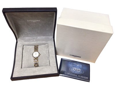 Lot 151 - Longines stainless steel wristwatch on bi-metal bracelet. Boxed with guarantee card and booklet