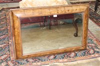 Lot 1386 - Laburnum oyster veneered wall mirror, the...