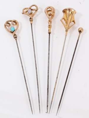 Lot 711 - Group of five Edwardian Art Nouveau gold and yellow metal hat pins