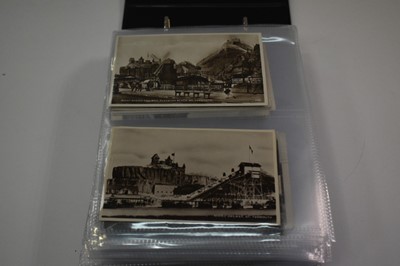 Lot 1416 - postcards in two albums including coastal cards, GB topography, real photographs etc.