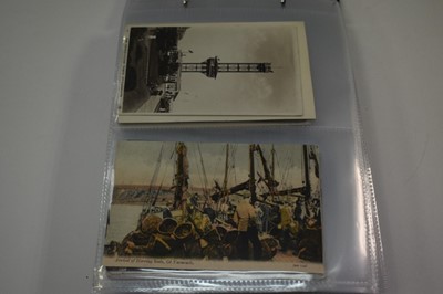 Lot 1416 - postcards in two albums including coastal cards, GB topography, real photographs etc.