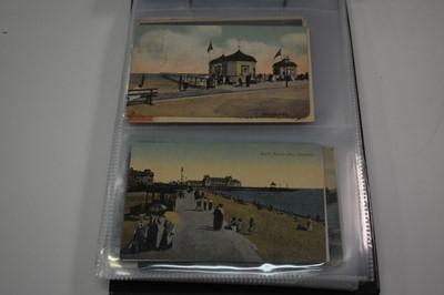 Lot 1416 - postcards in two albums including coastal cards, GB topography, real photographs etc.