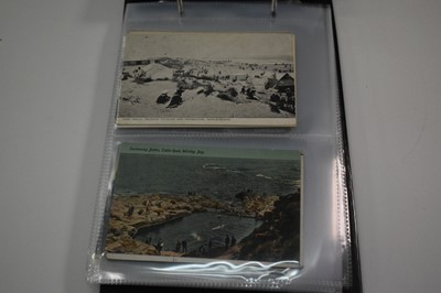 Lot 1416 - postcards in two albums including coastal cards, GB topography, real photographs etc.