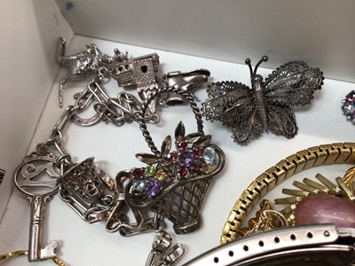 Lot 1023 - Silver charm bracelet, silver gem set floral basket brooch, vintage costume jewellery, pocket watch and various wristwatches