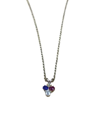 Lot 16 - Victorian diamond ruby and blue sapphire pendant in the form of a spade, on a modern 9ct gold chain