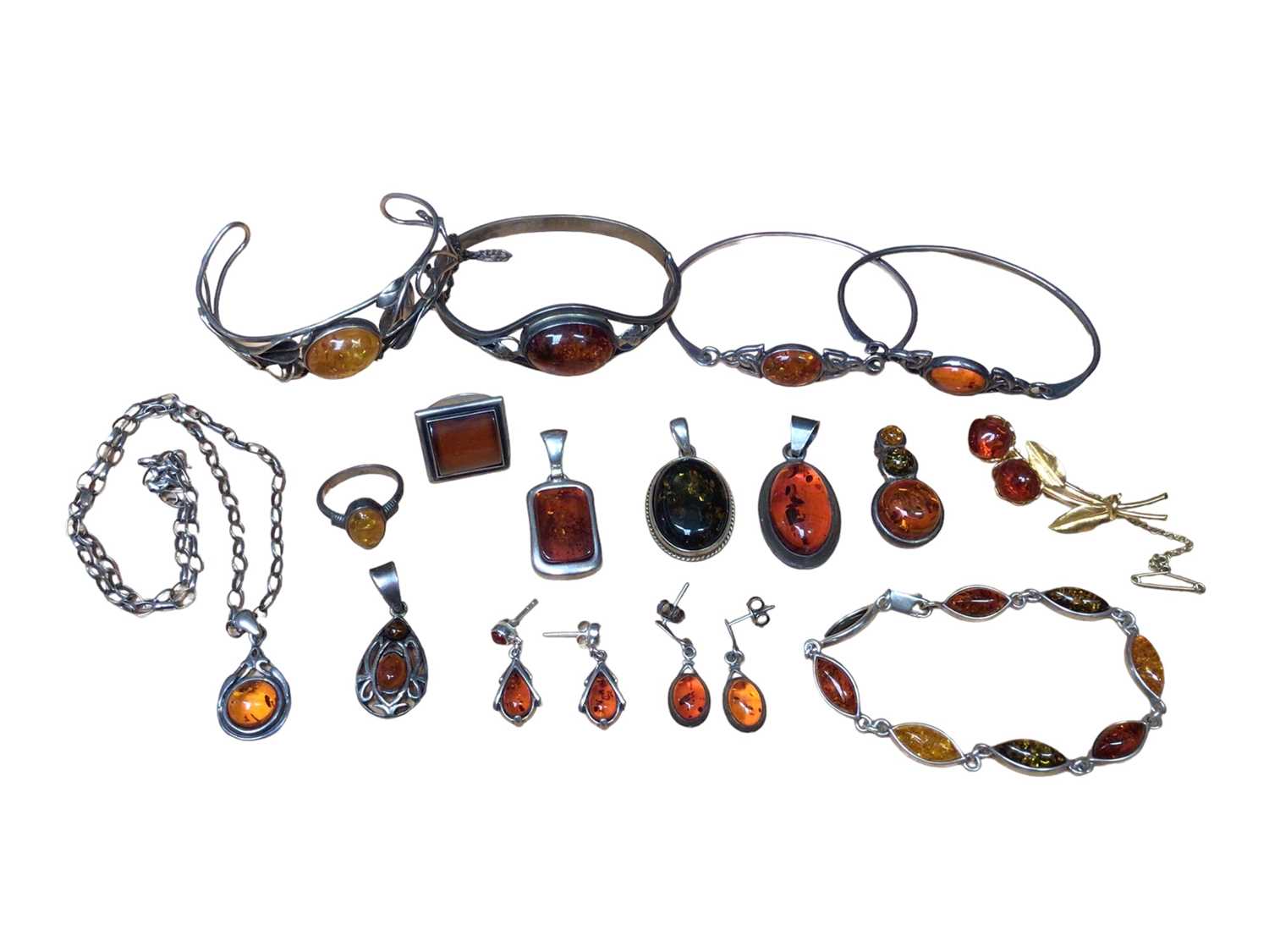 Lot 63 - Group of silver mounted amber jewellery