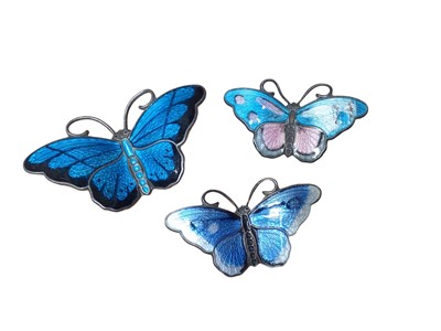 Lot 64 - Group of enamelled brooches including a David Anderson silver and enamel butterfly brooch