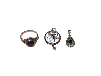 Lot 67 - 14ct gold ring set with an oval polished semi precious stone, Edwardian 9ct gold insect pendant and a yellow metal mounted sapphire pendant