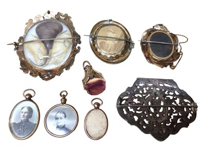 Lot 69 - Victorian brooch with rotating glazed panel containing a portrait photograph and hairwork design to reverse and others