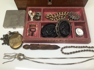 Lot 1001 - Antique wooden jewellery box containing two cameo brooches, Victorian silver brooch, silver chains, gilt metal Mizpah locket pendant on chain, carved wood needle case and other items