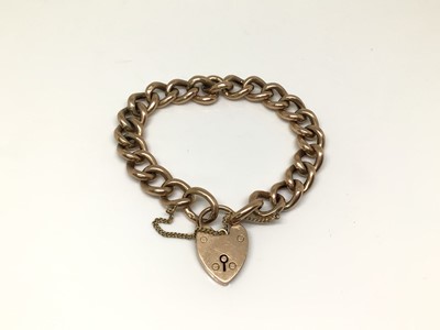 Lot 1013 - 9ct rose gold curb link bracelet with padlock clasp