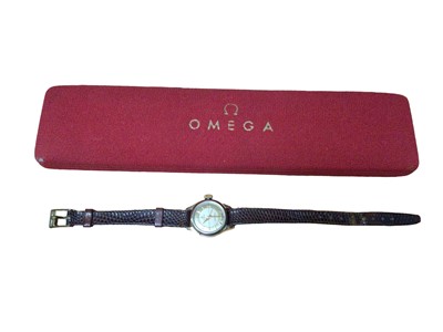 Lot 146 - 1950s ladies Omega Seamaster wristwatch on replacement leather strap, with original box and papers