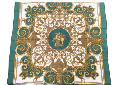 Lot 2105 - Hermès silk scarf Les Tuileries, green and gold, designer Joachim Metz, c1990, with double tag, 90 x 90cm approximately.