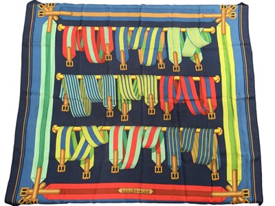 Lot 2106 - Hermès silk scarf Les Sangles, blue, designer Joachim Metz, 90 x 90cm approximately.