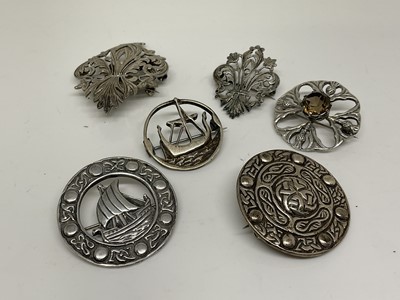 Lot 1072 - Scottish Iona sterling silver brooch, three other silver brooches and similar