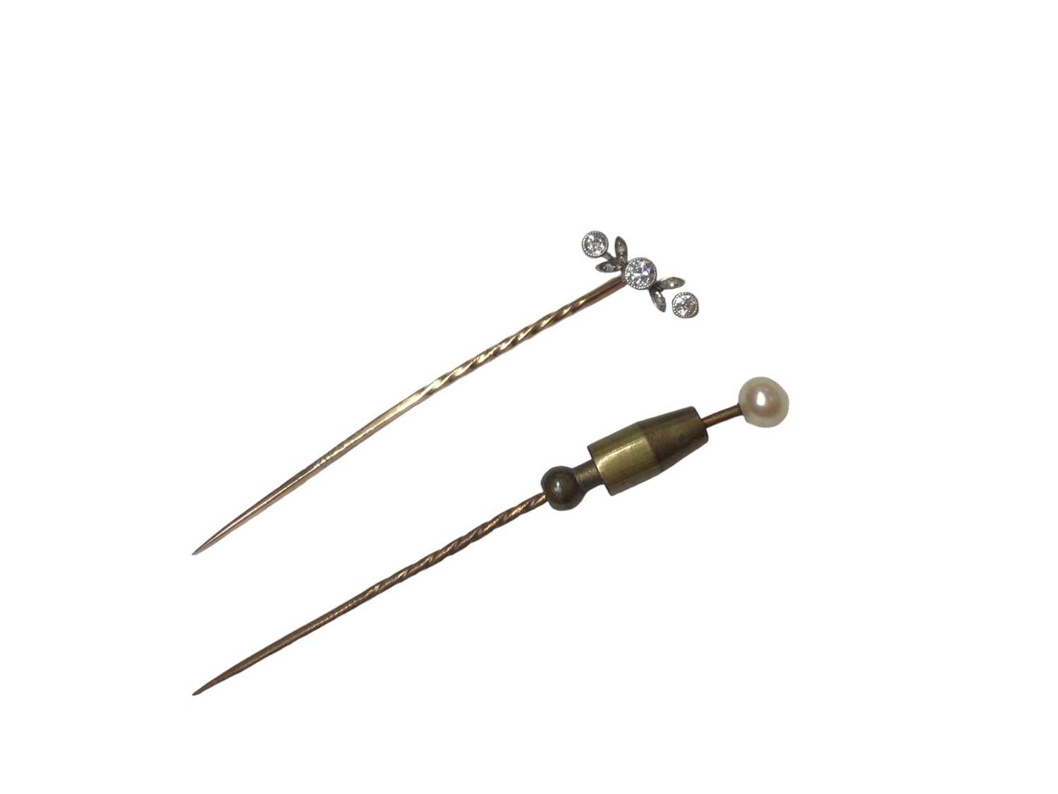 Lot 124 - Victorian diamond three stone stick pin in