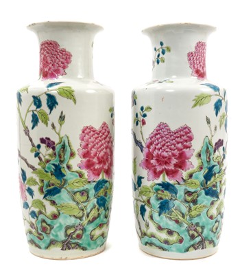 Lot 282 - Pair of 19th century Chinese famille rose rouleau vases, with double ring mark to bases