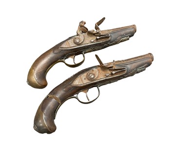 Lot 865 - Pair of 18th century Continental walnut stocked muff pistols