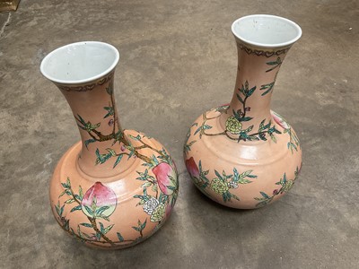 Lot 131 - Pair of Chinese Qing style vases decorated with peaches
